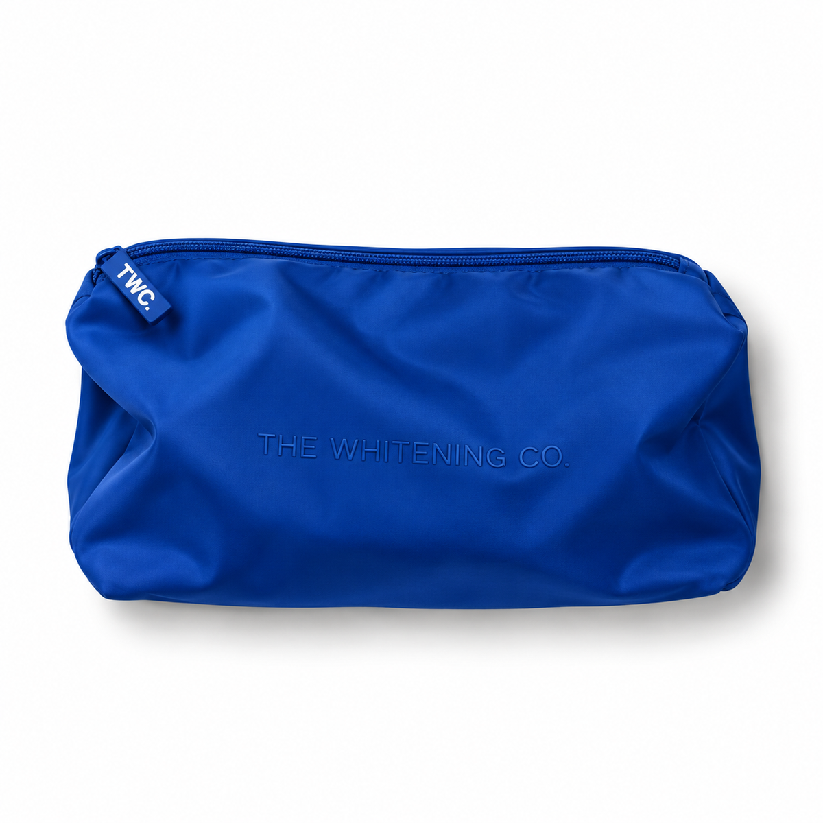 The Beauty Bag in Cobalt, soft blue puffy nylon