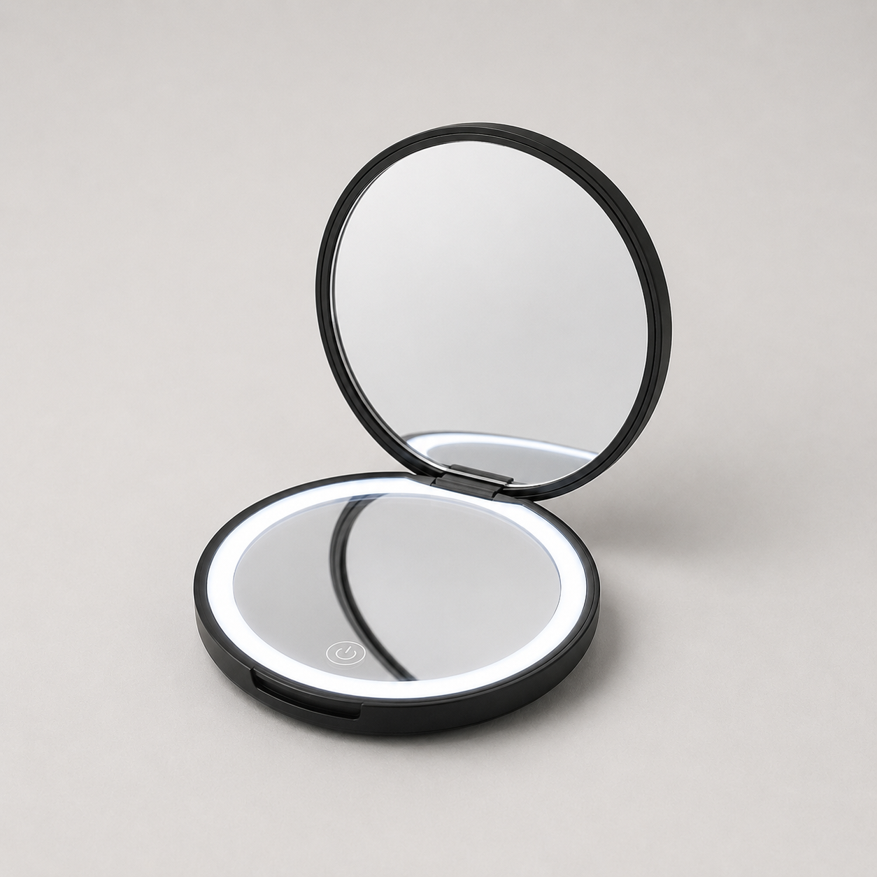 TWC LED E-Mirror open at an angle with LED ring light on, studio shot